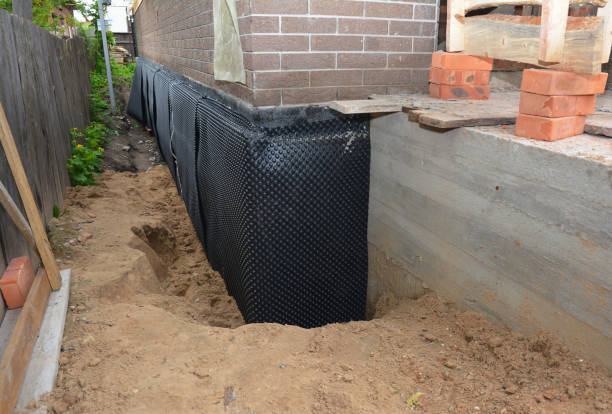 SJ Waterproofing Pros technician performing targeted Waterproofing assessment in Lebanon, KY
